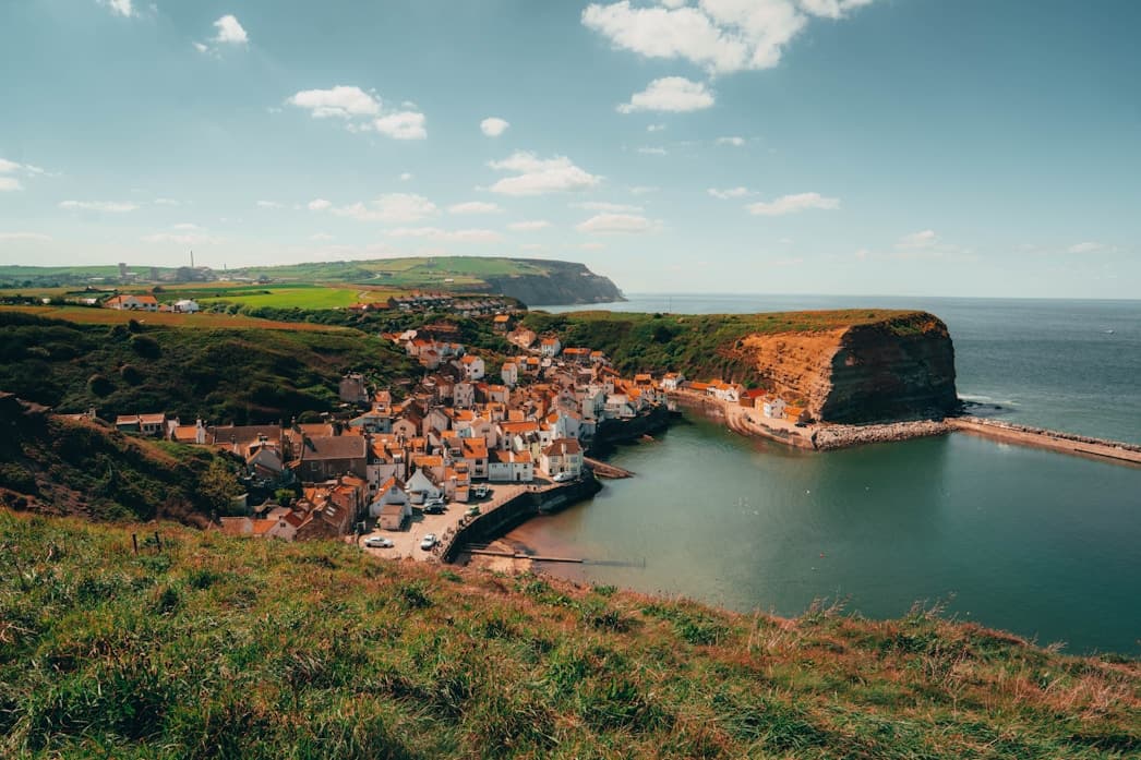 A cliff-top fishing village above a harbour