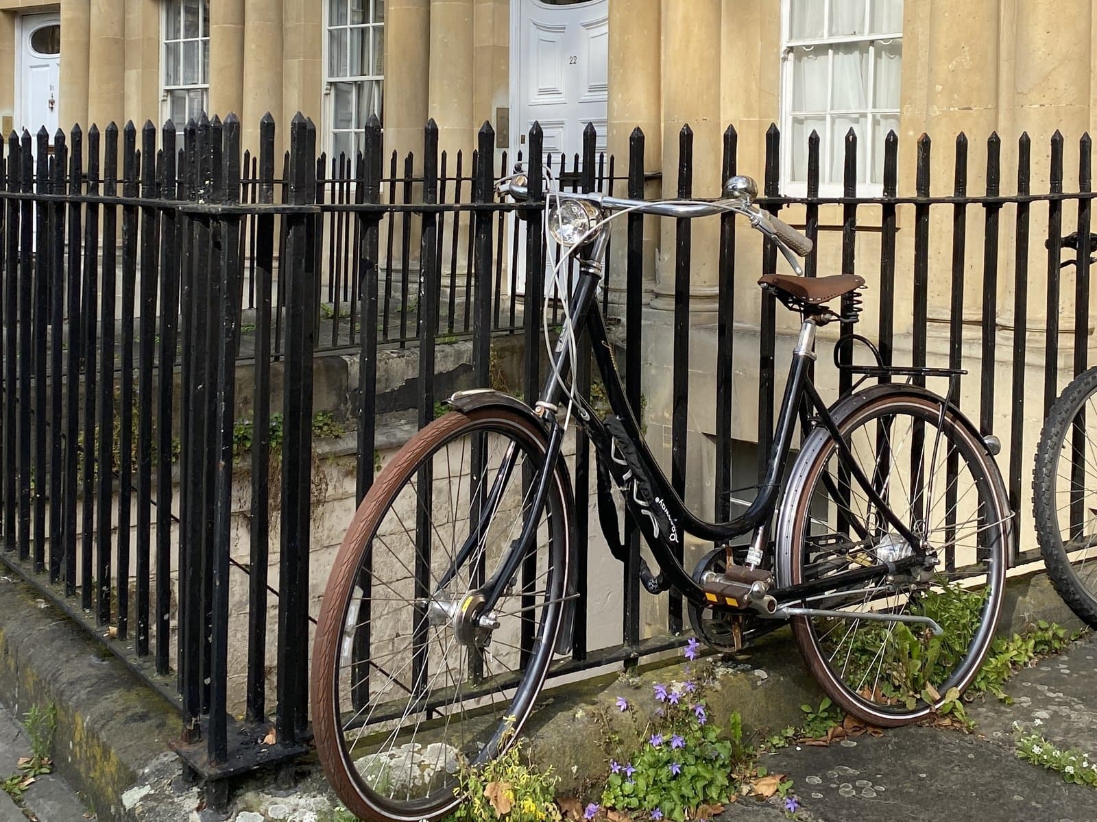 A bicycle against the railings of the Circus