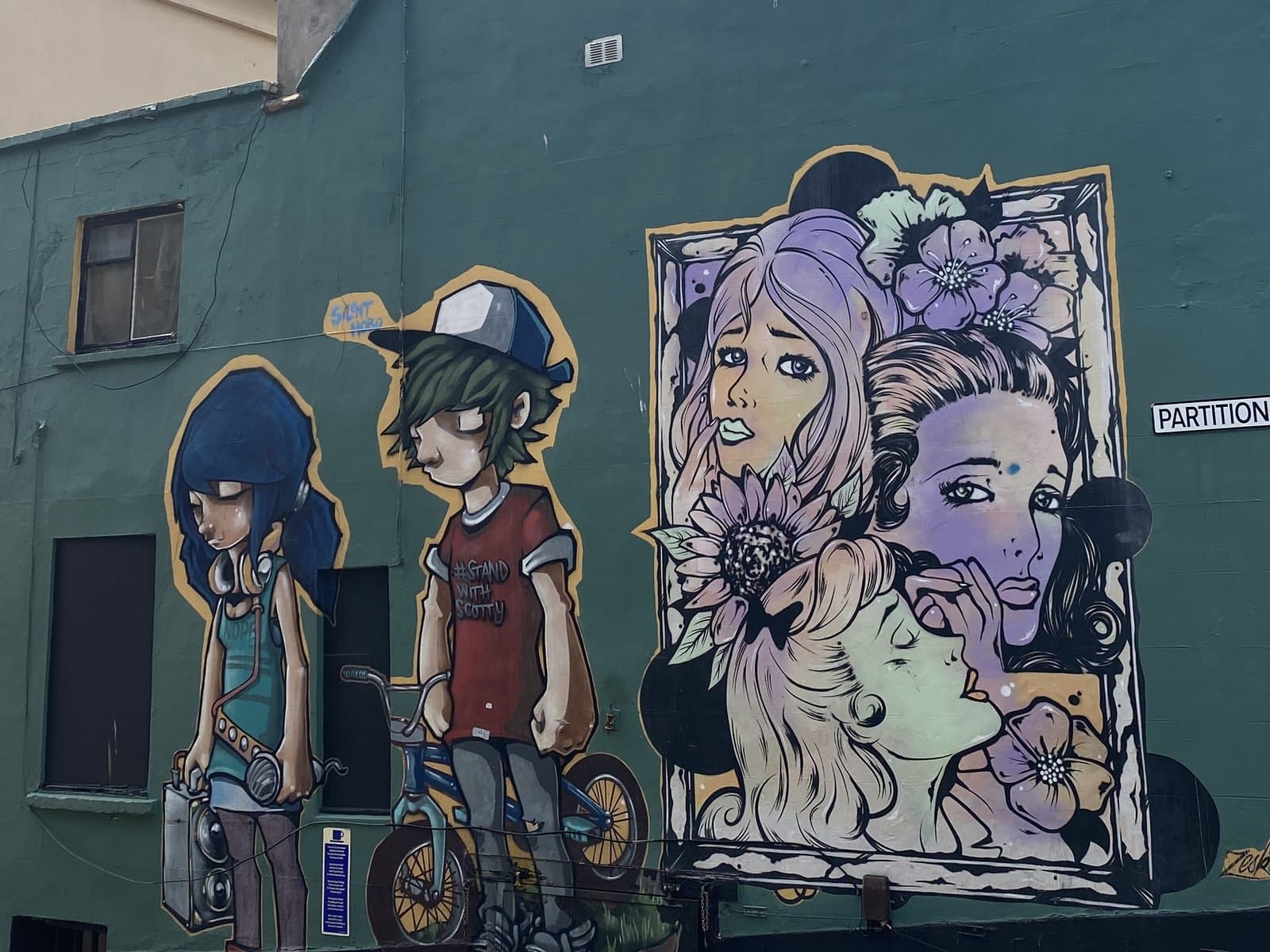 A street-art mural on a gable end in Bristol