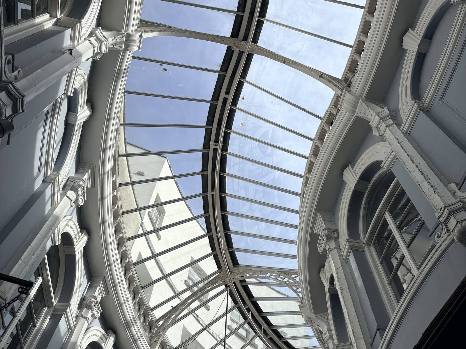 The curving glass roof of a Cardiff arcade