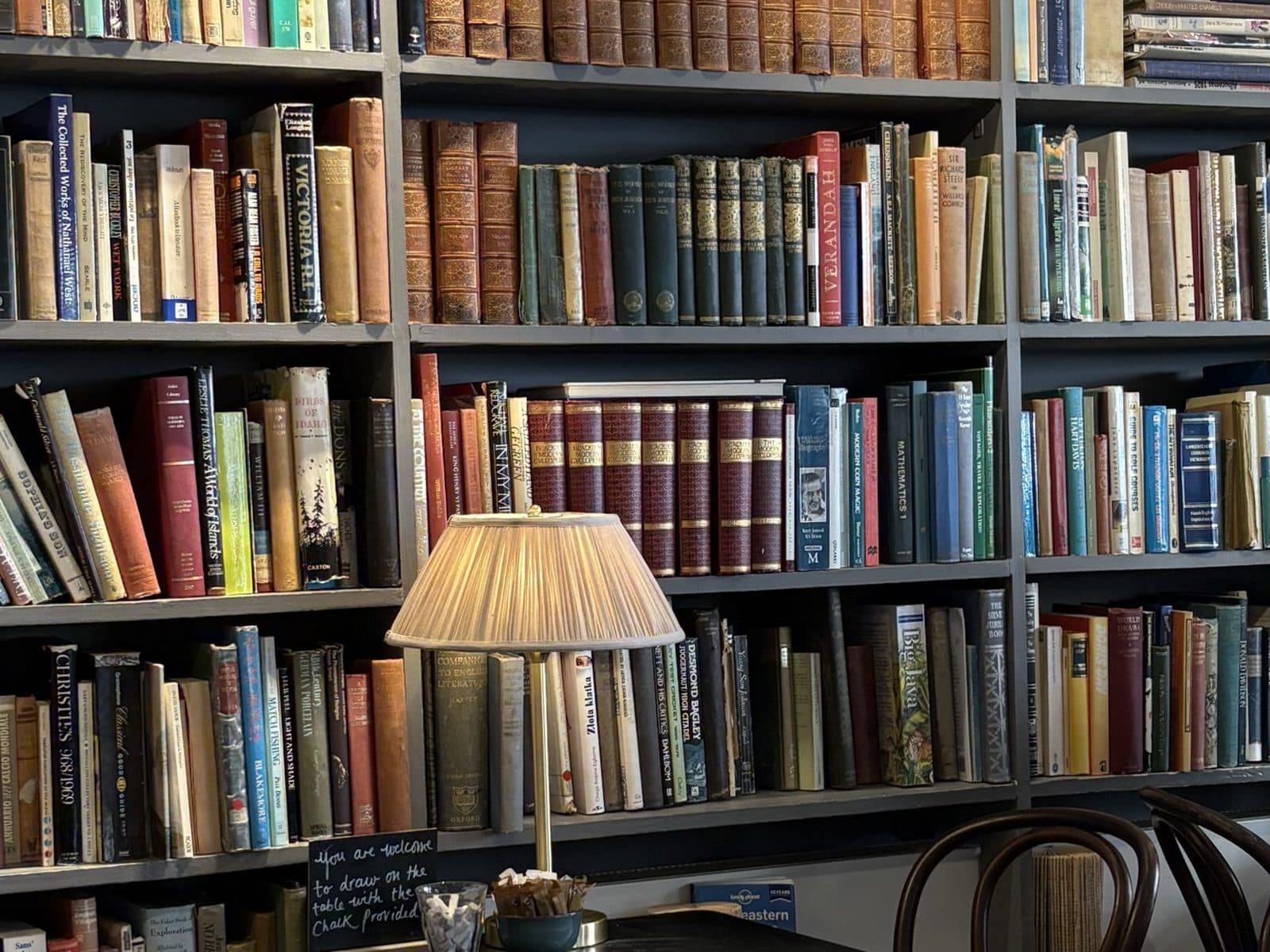 Book-lined walls at Steep Street Coffee House