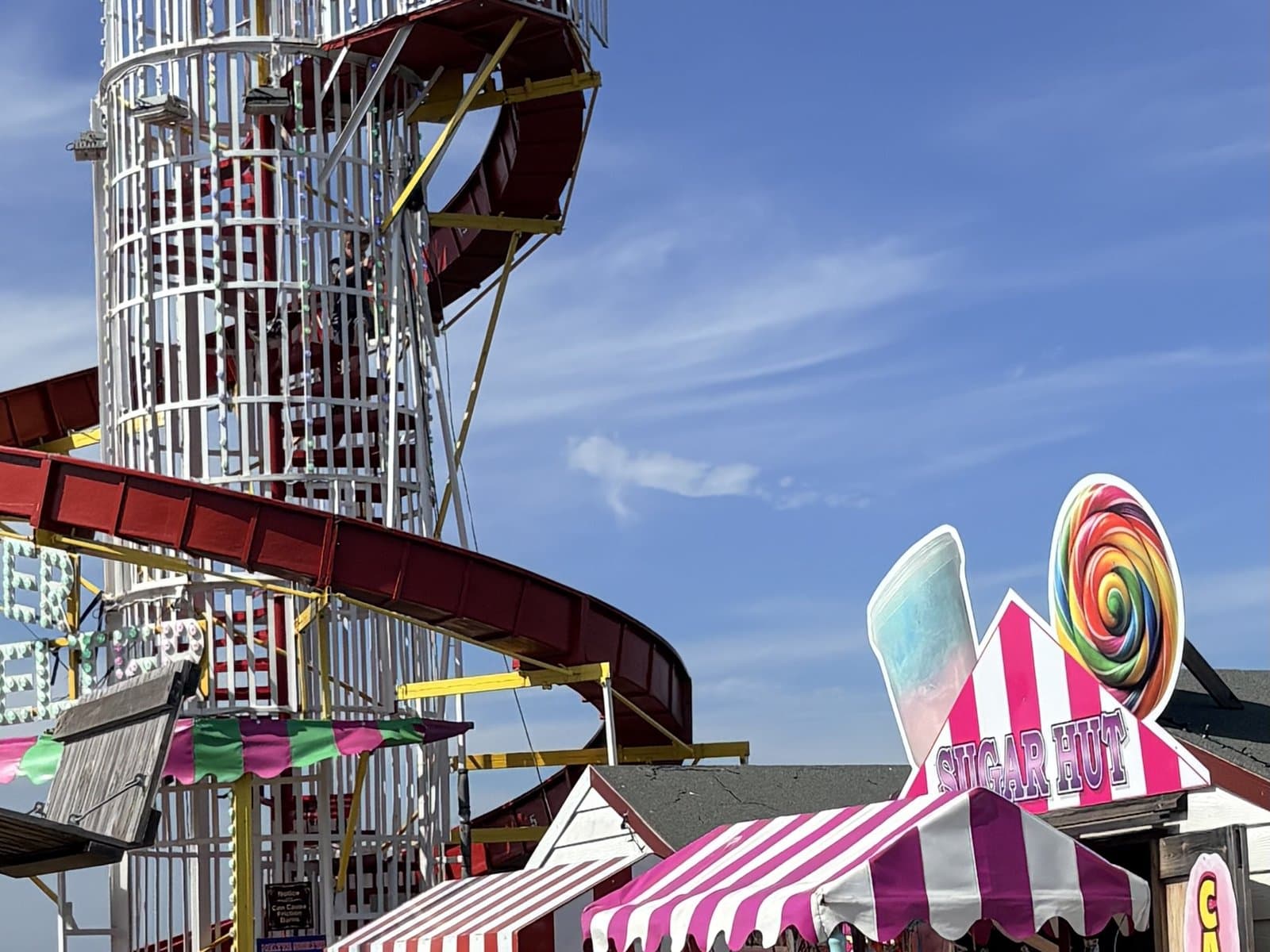 A helter-skelter and stalls on the seafront